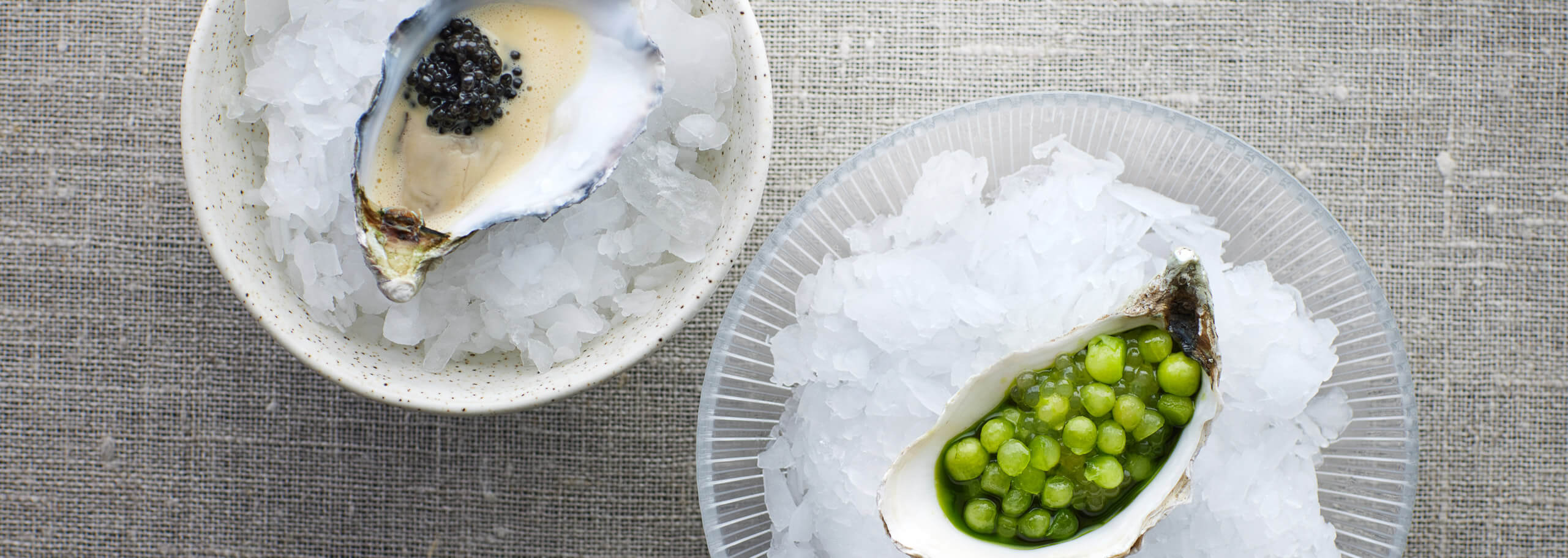 Restaurant RADIO østers med caviar, hvidvins sauce og grøn urte olie